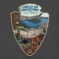 Detail view of Circle of Discovery - Southern Cascades - Charcoal Tshirt featuring Crater Lake, Redwoods, Oregon Caves, Lava Tubes, and Lassen Volcanic National Parks.