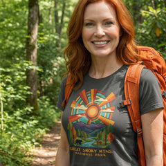 Model wearing radiant sunburst Great Smoky Mountains National Park Charcoal T-Shirt hiking.