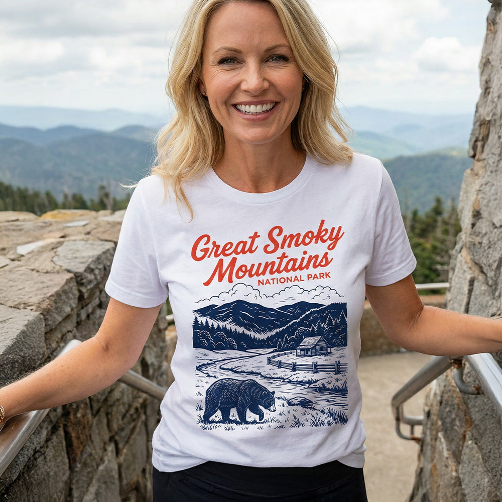 Model wearing vintage Great Smoky Mountains National Park Illustrated design featuring Cade's Cove and Black Bear on White Tshirt