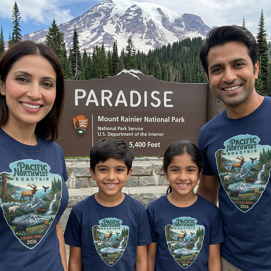 Family wearing matching Personalized Pacific Northwest Family Vacation themed custom navy t-shirts in adult and youth sizes featuring scenery and wildlife from Mt. Rainier, North Cascades and Olympic National Parks.