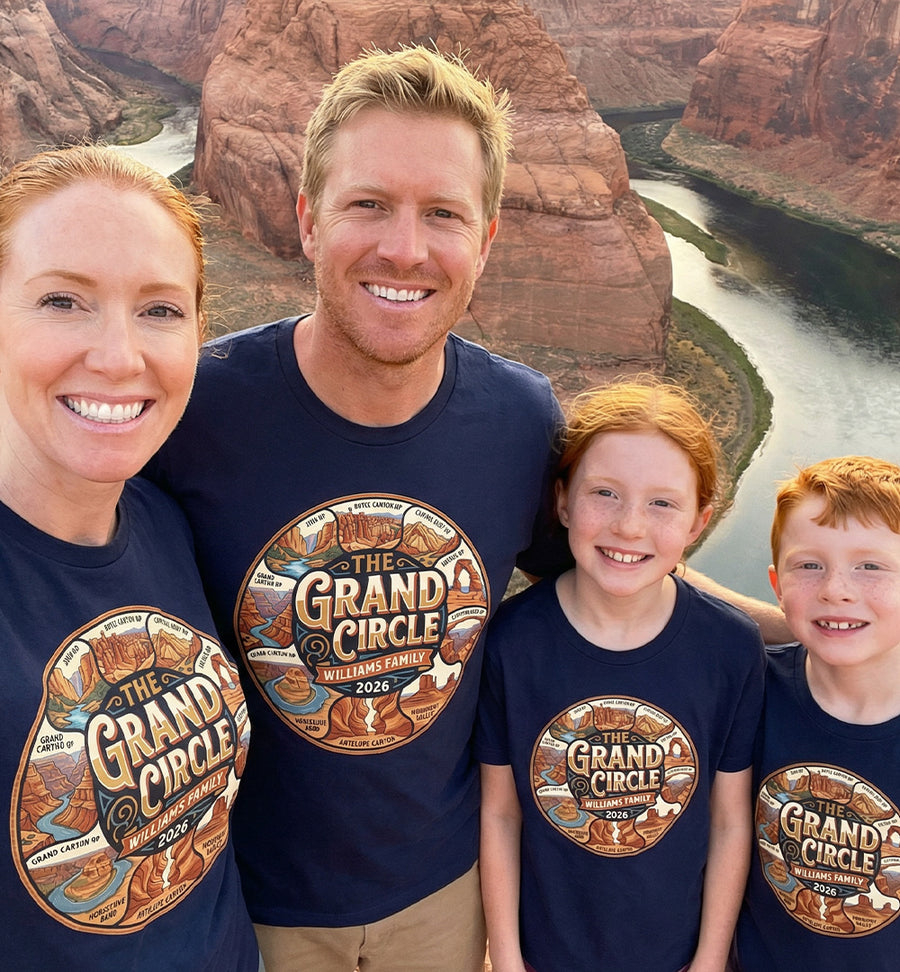 Family wearing a personalized Grand Circle Family Vacation themed custom navy t-shirt in adult and youth sizes featuring names of National Parks in a circle badge design.