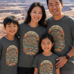 Family wearing matching Personalized Grand Circle Family Vacation themed custom charcoal t-shirts in adult and youth sizes featuring names of National Parks in an rounded badge design.