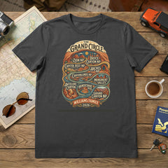 Personalized Grand Circle Family Vacation themed custom charcoal t-shirts in adult and youth sizes featuring names of National Parks in a rounded badge design.
