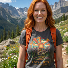 Model wearing radiant sunburst Rocky Mountain National Park Charcoal T-Shirt hiking.