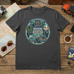 Circle of Discovery - Southern Cascades - Badge Design - Charcoal Tshirt featuring Crater Lake, Redwoods, Oregon Caves, Lava Tubes, and Lassen Volcanic National Parks.